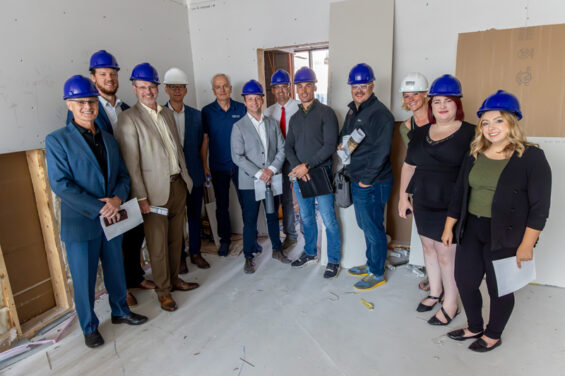 Members of the EDC board of directors receive a tour of The Olive Ann Hotel in downtown Grand Forks.