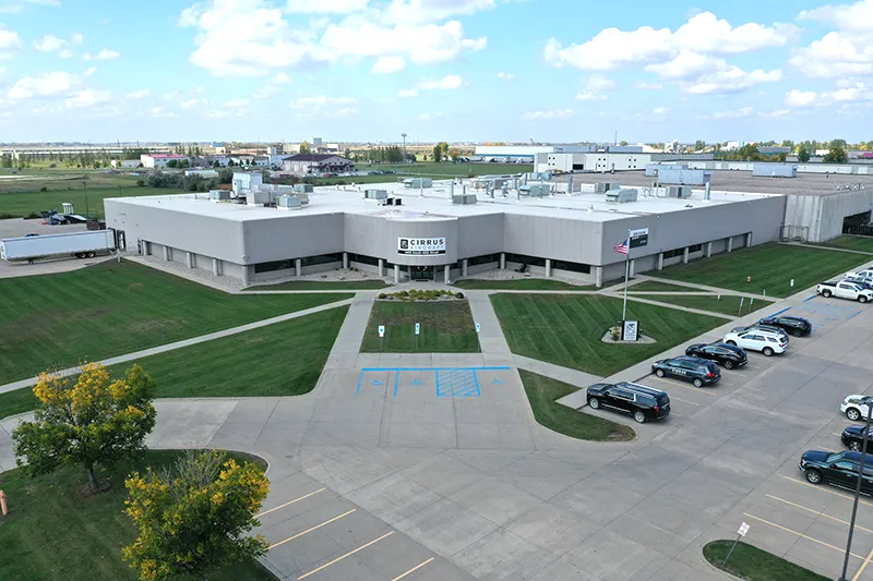 A bird's eye view of the entrance of Cirrus Aircraft manufacturing facility in Grand Forks, ND.